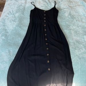Long black button dress, bikini strap
